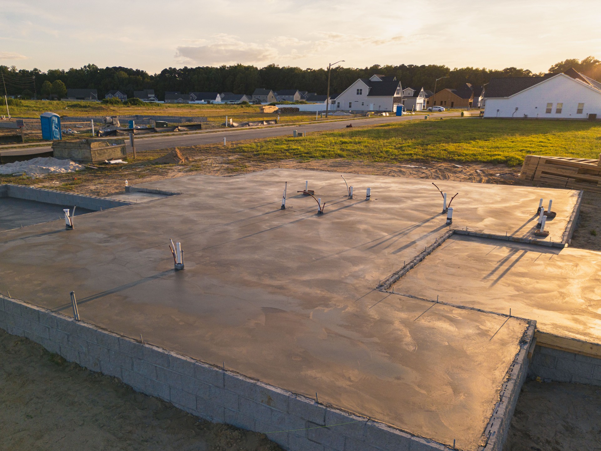 Concrete Slab - New Home Under Construction - Back Lit - Close Up